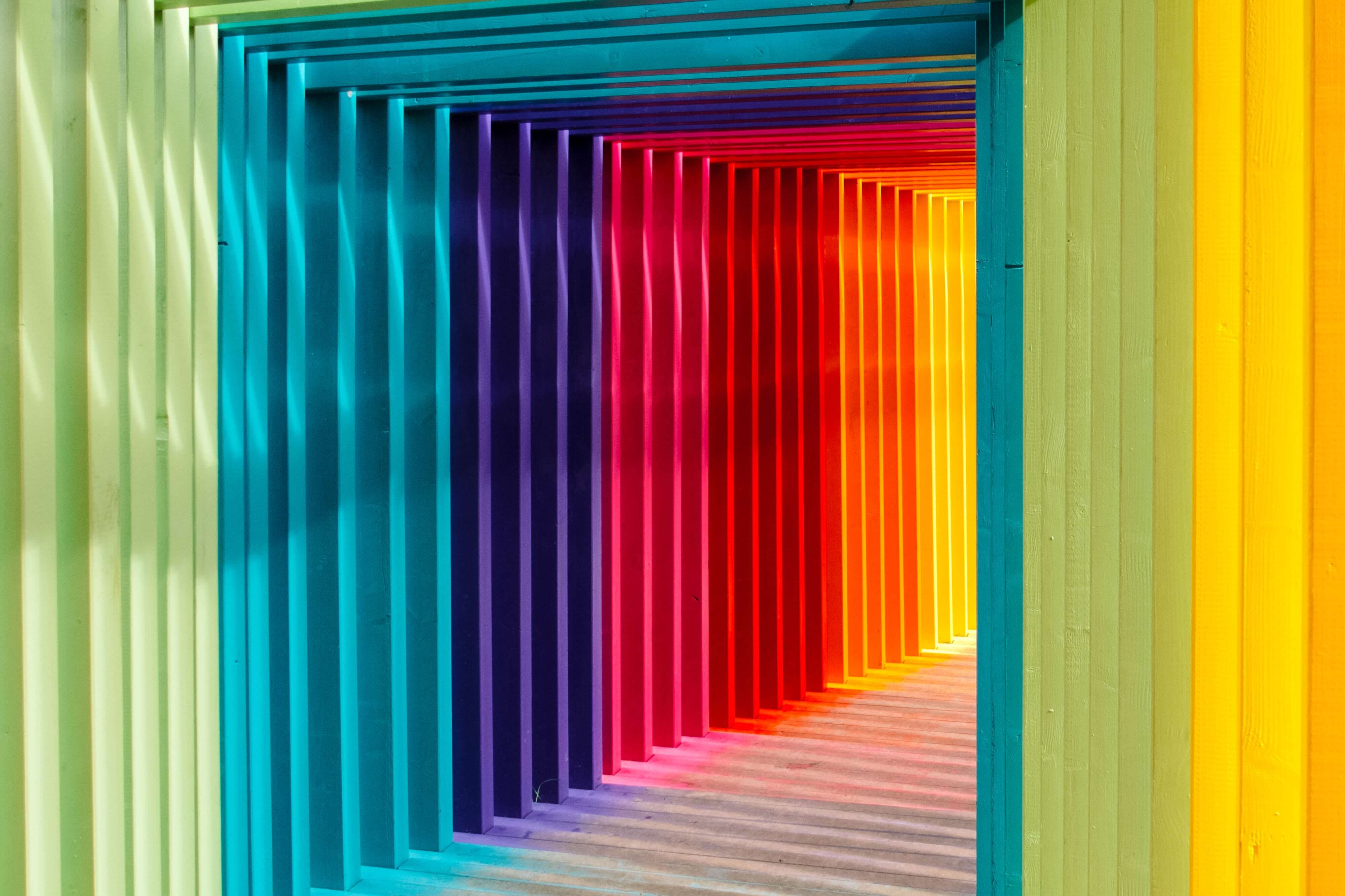 inside of a rectangular rainbow archway tunnel